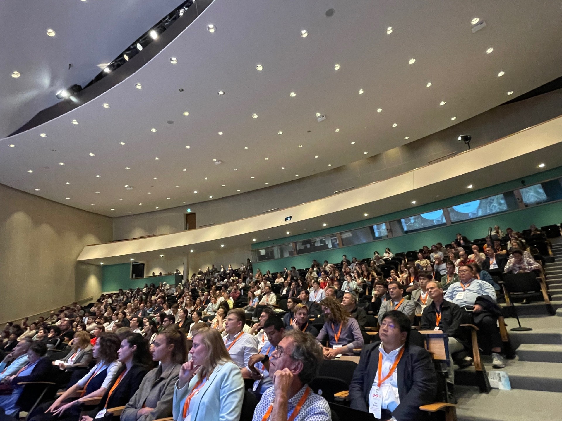 Audience seated in large auditorium during keynote session at European Congress on Biotechnology